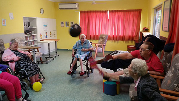 Our residents trying some Balloon Tennis